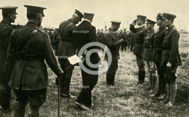 King George V decorates British personnel, Belgium, First World War, 1914-1918, (c1920). Creator: Unknown.