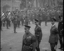 King George V, Edward, Prince of Wales, and Prince Albert Walking in Procession During..., 1920. Creator: British Pathe Ltd