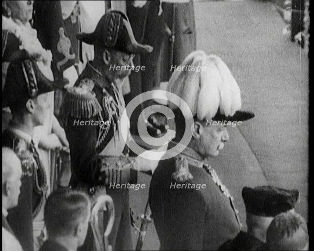 King George V of the United Kingdom Reading a Speech to a Crowd. He Is Accompanied by..., 1924. Creator: British Pathe Ltd.