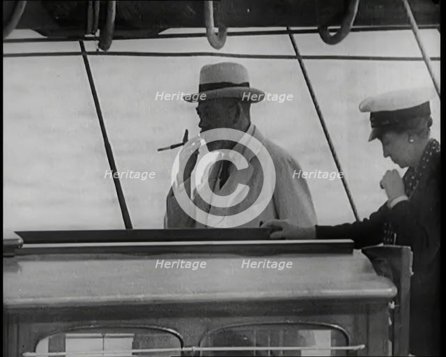King George V on the Deck of the Royal Yacht Accompanied by Male and Female Civilians, 1926. Creator: British Pathe Ltd.