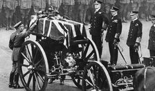 King George V places a wreath on the coffin of an unknown soldier, Whitehall, London, c1930s