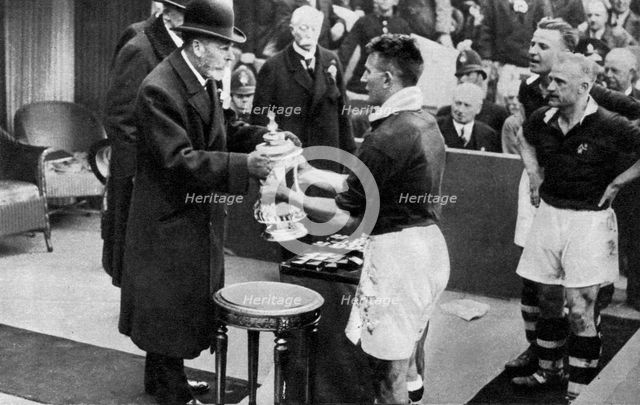 King George V presenting the FA Cup, Wembley Stadium, London, c1923-1936 (1937).Artist: Fox