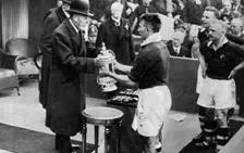 King George V presenting the FA Cup, Wembley Stadium, London, c1923-1936 (1937).Artist: Fox