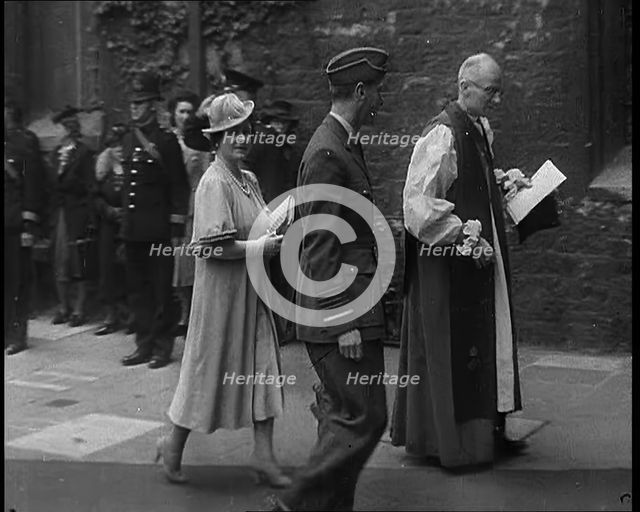 King George VI and Queen Elizabeth Being Greeted by Dean of Westminster Paul De Labilliere..., 1940. Creator: British Pathe Ltd.