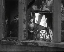 King George VI and Queen Elizabeth Inspecting Bomb Damage, 1942. Creator: British Pathe Ltd