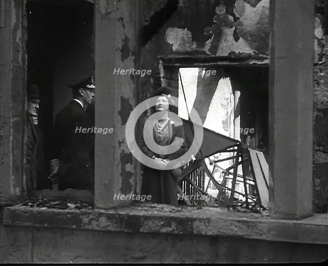 King George VI and Queen Elizabeth Inspecting Bomb Damage, 1942. Creator: British Pathe Ltd.