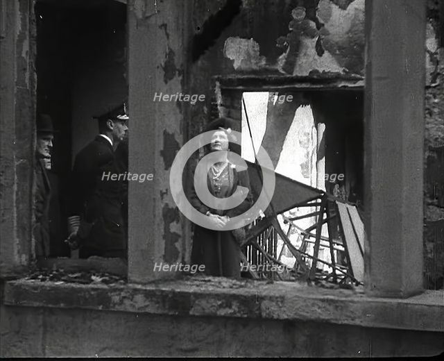 King George VI and Queen Elizabeth Inspecting Bomb Damage, 1942. Creator: British Pathe Ltd.