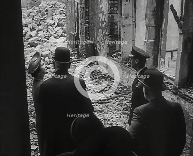King George VI and Queen Elizabeth Inspecting Bomb Damage, 1942. Creator: British Pathe Ltd.