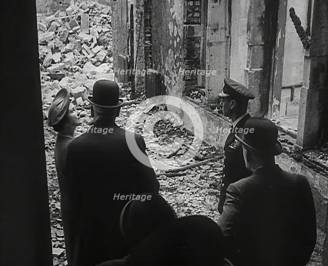 King George VI and Queen Elizabeth Inspecting Bomb Damage, 1942. Creator: British Pathe Ltd.