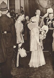 King George VI and Queen Elizabeth leaving a luncheon in honour of coronation 1937. Creator: Unknown