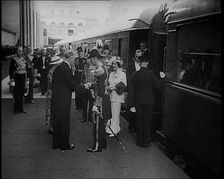 King George VI and Queen Elizabeth of Britain Being Greeted in Paris at Bois de Boulogne..., 1938. Creator: British Pathe Ltd