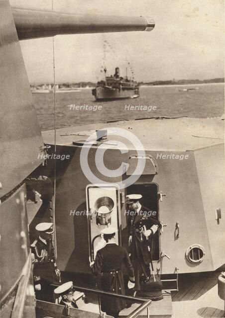 'King George VI in the gun turret of H.M.S Southampton', 1937. Artist: Unknown.
