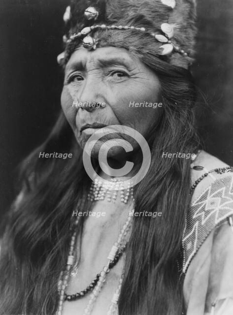 Klamath woman, head-and-shoulders portrait, facing left, c1923. Creator: Edward Sheriff Curtis.