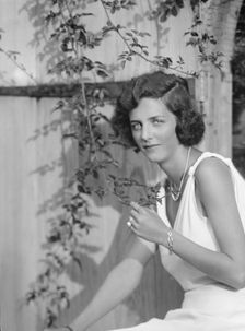 Kramer, A.L., Mrs. (Alice Bishop), seated outdoors, 1932 Creator: Arnold Genthe