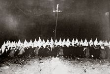 Ku Klux Klan initiation ceremony near Brunswick, Maryland, USA, c1920s(?). Creator: Unknown