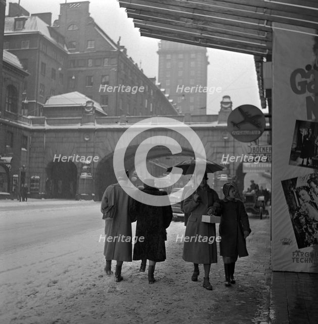 Kungsgatan, (King's Street) in winter, Stockholm, Sweden, 1950. Creator: Torkel Lindeberg.