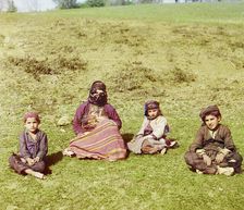 Kurd woman with children [Artvin], between 1905 and 1915. Creator: Sergey Mikhaylovich Prokudin-Gorsky