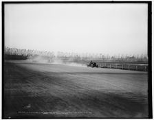H.S. Harkness in his Mercedes-Simplex, winning five-miles event...Grosse Pointe track...c1902. Creator: Unknown