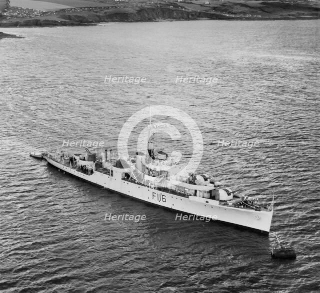 HMS 'Amethyst' (F116) moored off the Plymouth Breakwater, Plymouth, Devon, 1950. Artist: Aerofilms.