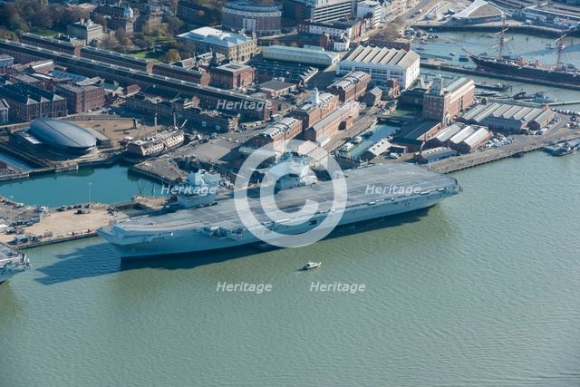 HMS Prince of Wales aircraft carrier in dock with HMS Victory, Portsmouth, Hants, 2020. Creator: Damian Grady.