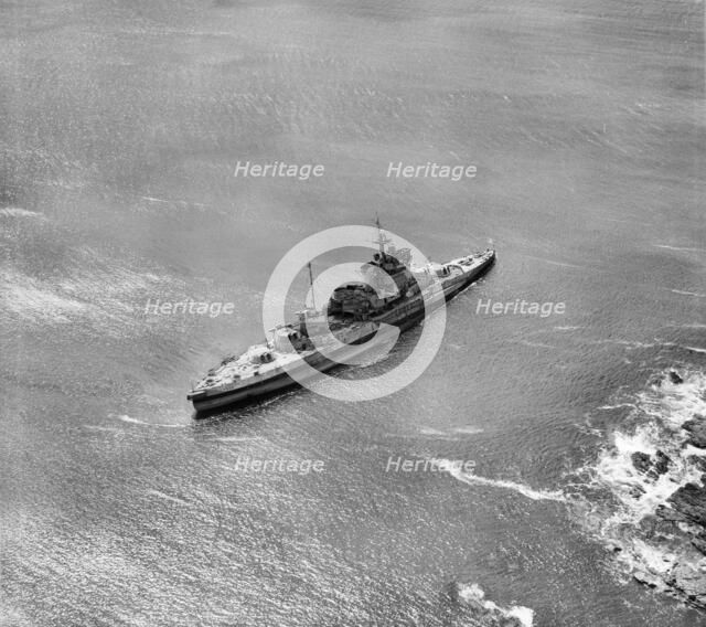 HMS 'Warspite' aground in Prussia Cove, Cornwall, 1947. Artist: Aerofilms.