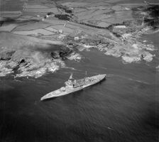 HMS Warspite aground in Prussia Cove, Cornwall, May 1947. Artist: Aerofilms