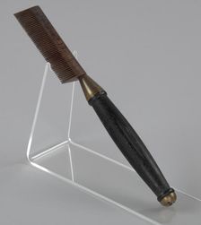 Hot comb from a travel hair care kit used by Anna Mae Queen Holmes, mid 20th century. Creator: Reck-Junior
