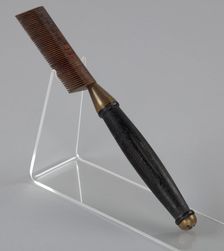 Hot comb from a travel hair care kit used by Anna Mae Queen Holmes, mid 20th century. Creator: Reck-Junior