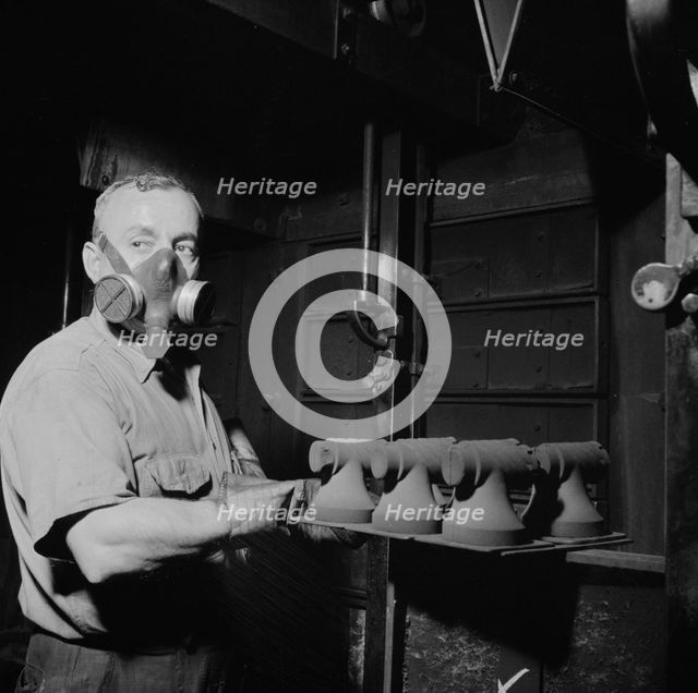Hot cores to be used by the U.S. Army to make molds for meat..., New Britain, Connecticut, 1943. Creator: Gordon Parks.