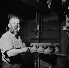Hot cores to be used by the U.S. Army to make molds for meat..., New Britain, Connecticut, 1943. Creator: Gordon Parks