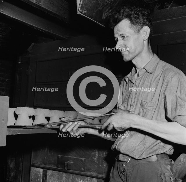 Hot cores to be used by the U.S. Army to make molds for meat..., New Britain, Connecticut, 1943. Creator: Gordon Parks.