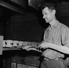 Hot cores to be used by the U.S. Army to make molds for meat..., New Britain, Connecticut, 1943. Creator: Gordon Parks
