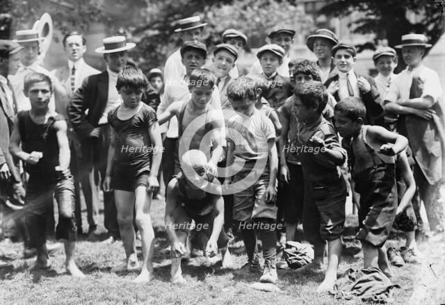 Hot day in N.Y., after a swim in fountain., between c1910 and c1915. Creator: Bain News Service.