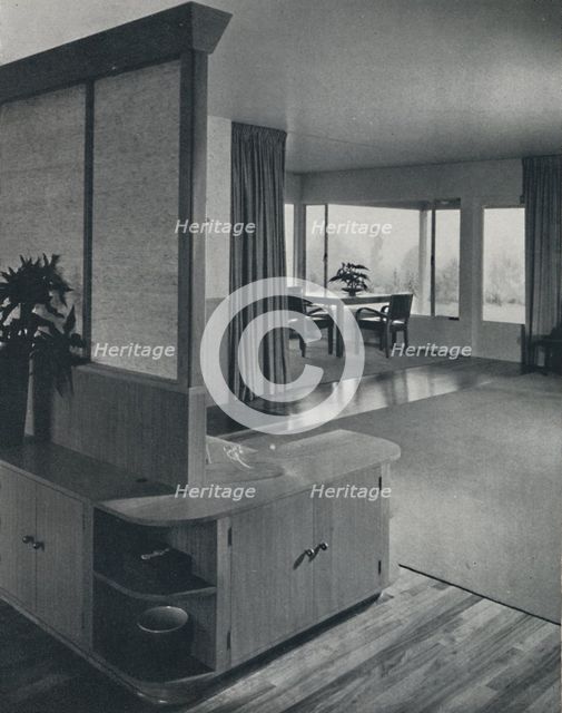 'House at Pomona, California...looking across the living room', 1942.  Artist: Unknown.