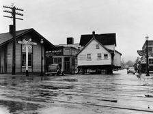 House being moved through the main street of town..., Cottage Grove, Lane County, Oregon, 1939. Creator: Dorothea Lange