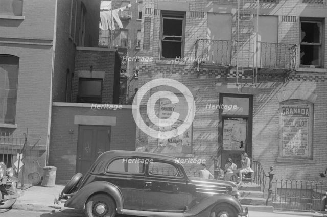 House fronts, 61st Street between 1st and 3rd Avenues, New York, 1938. Creator: Walker Evans.