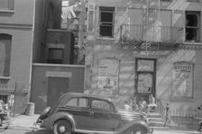 House fronts, 61st Street between 1st and 3rd Avenues, New York, 1938. Creator: Walker Evans