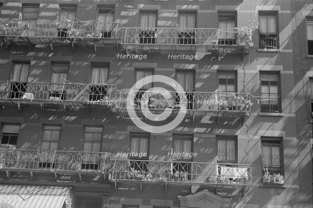 House fronts, 61st Street between 1st and 3rd Avenues, New York, 1938. Creator: Walker Evans.