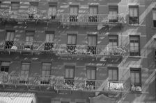 House fronts, 61st Street between 1st and 3rd Avenues, New York, 1938. Creator: Walker Evans
