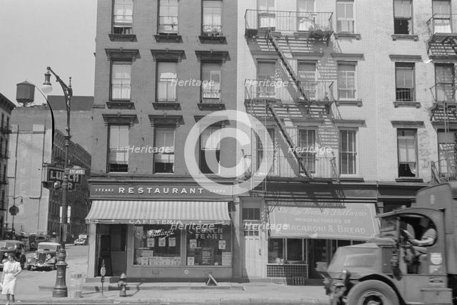 House fronts, 61st Street between 1st and 3rd Avenues, New York, 1938. Creator: Walker Evans.