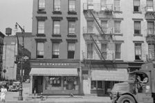 House fronts, 61st Street between 1st and 3rd Avenues, New York, 1938. Creator: Walker Evans