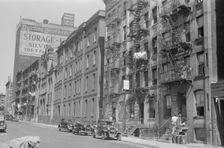 House fronts, 61st Street between 1st and 3rd Avenues, New York, 1938. Creator: Walker Evans
