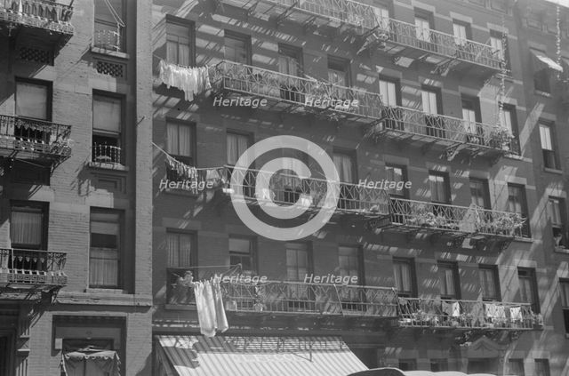 House fronts, 61st Street between 1st and 3rd Avenues, New York, 1938. Creator: Walker Evans.