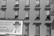 House fronts, 61st Street between 1st and 3rd Avenues, New York, 1938. Creator: Walker Evans