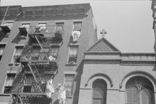 House fronts, 61st Street between 1st and 3rd Avenues, New York, 1938. Creator: Walker Evans