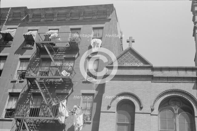 House fronts, 61st Street between 1st and 3rd Avenues, New York, 1938. Creator: Walker Evans.
