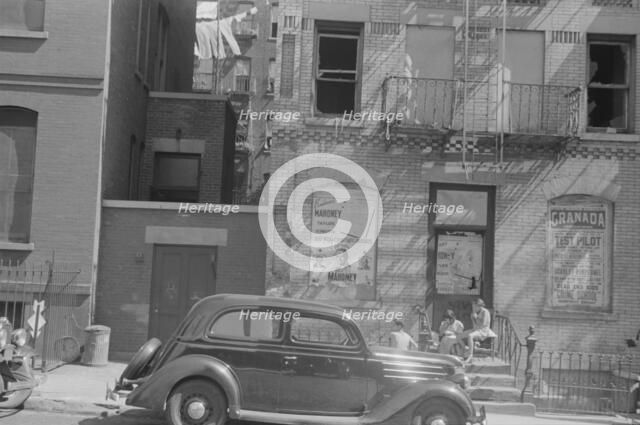 House fronts, 61st Street between 1st and 3rd Avenues, New York, 1938. Creator: Walker Evans.