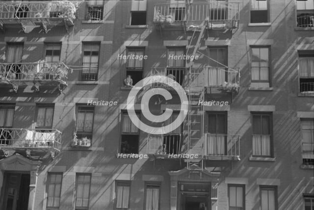 House fronts, 61st Street between 1st and 3rd Avenues, New York, 1938. Creator: Walker Evans.