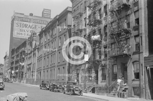 House fronts, 61st Street between 1st and 3rd Avenues, New York, 1938. Creator: Walker Evans.