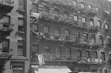 House fronts, 61st Street between 1st and 3rd Avenues, New York, 1938. Creator: Walker Evans